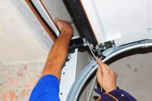 garage door specialist repairing